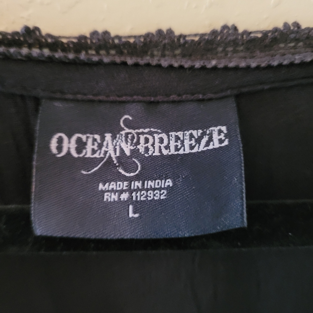 Ocean Breeze black and gold dress with floral prin - Picture 3 of 5
